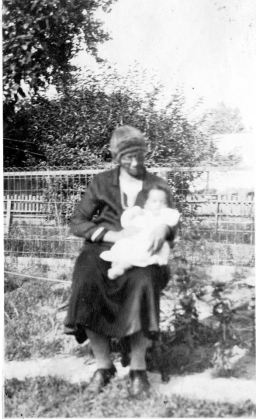 Martha Pleasant, born a slave in Virginia, holding her grandson, my father Neal Hemachandra