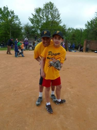 Ray and Nicholas Hemachandra at Nicholas' assisted baseball game last weekend in Asheville, North Carolina