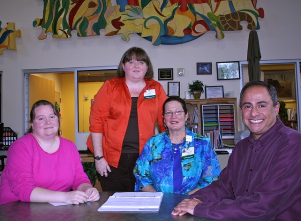 Leah Stroupe, Kate Glance, Roxann Colwell, and Ray Hemachandra at Family Support Network of Western North Carolina, which is part of Mission Children's Hospital in Asheville, N.C.