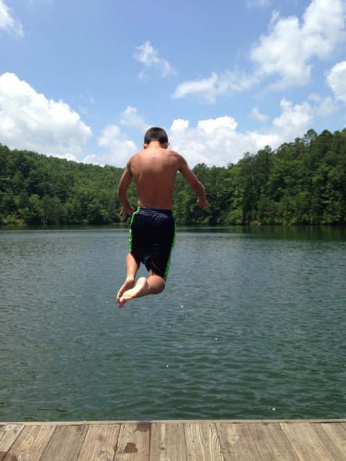 Nicholas leaps. (At Fawn Lake on Saturday.)