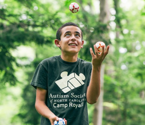 My son, Nicholas, juggles at the Asheville Botanical Gardens at University of North Carolina Asheville. (Photo by Tim Robison for the Mountain Xpress)