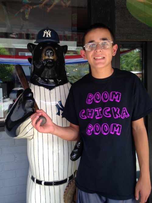 Boom Chicka Boom: my son Nicholas posing with the Yogi Berra bear in downtown Hendersonville, North Carolina, this past weekend.