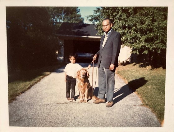 Ray Hemachandra and Neal Hemachandra at our house on Long Island with our dog, Butterscotch